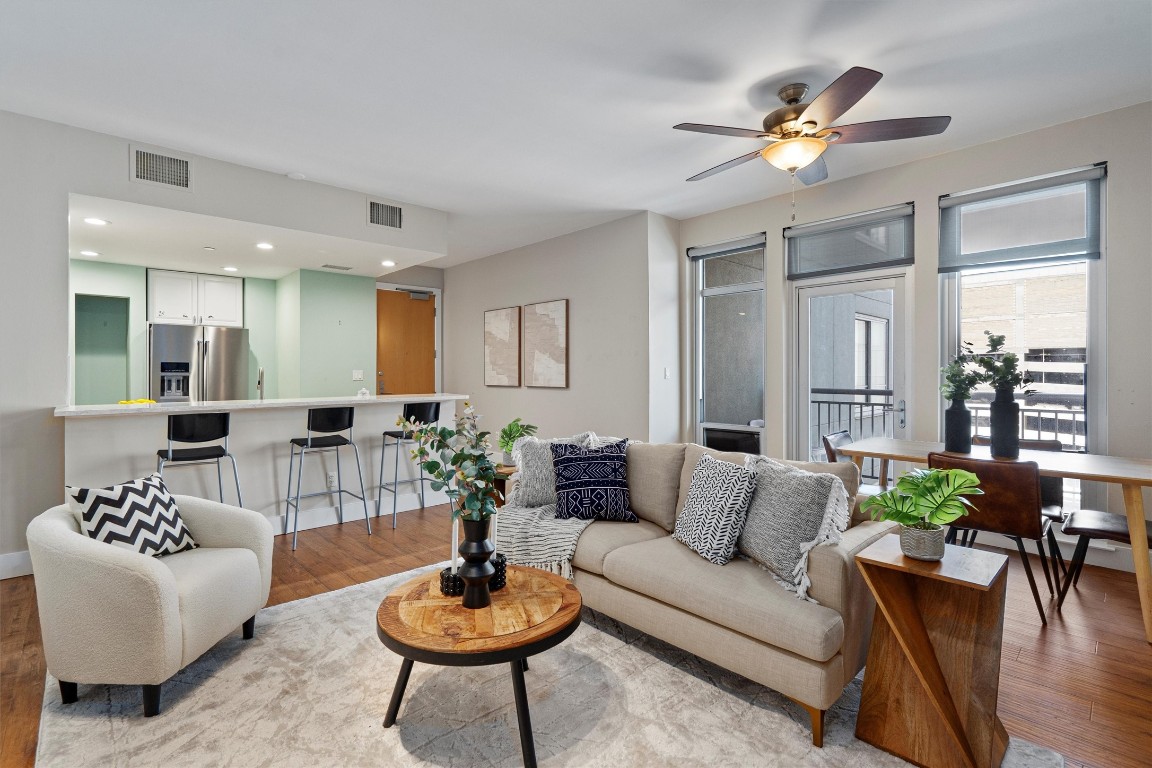 Living room features an abundance of natural light