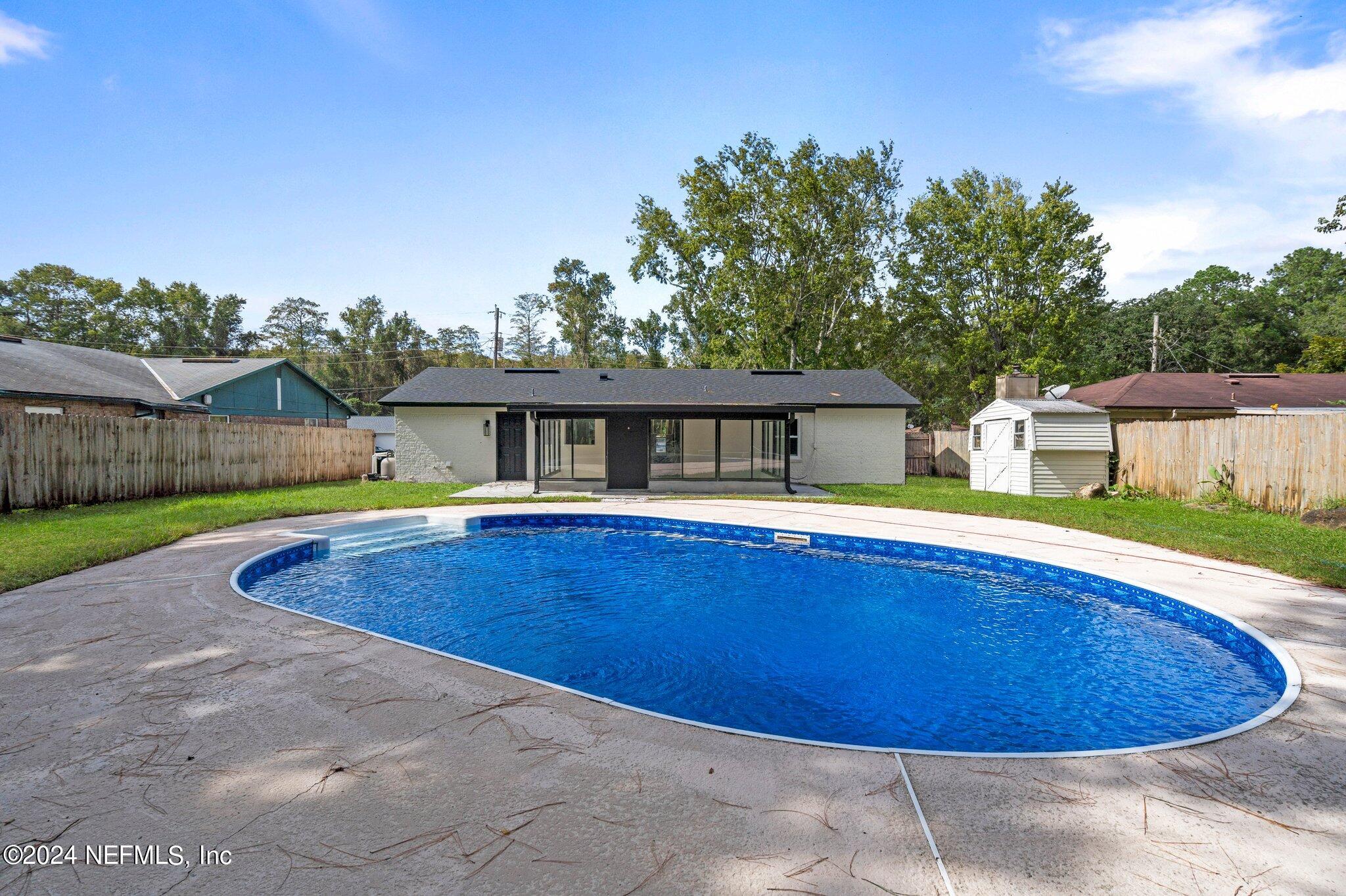 a view of a house with pool