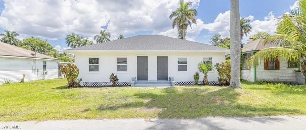 a house that has a big yard in front of it