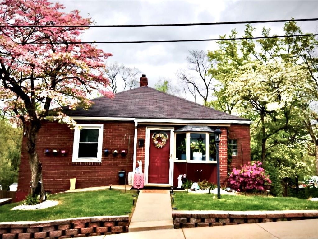 front view of house with a yard