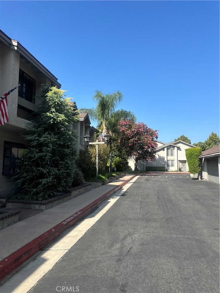 a view of a house with a street