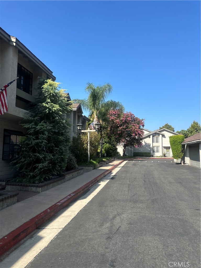 a view of a house with a street