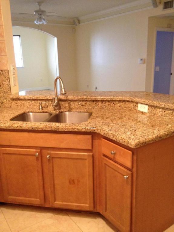 a view of a sink and a mirror