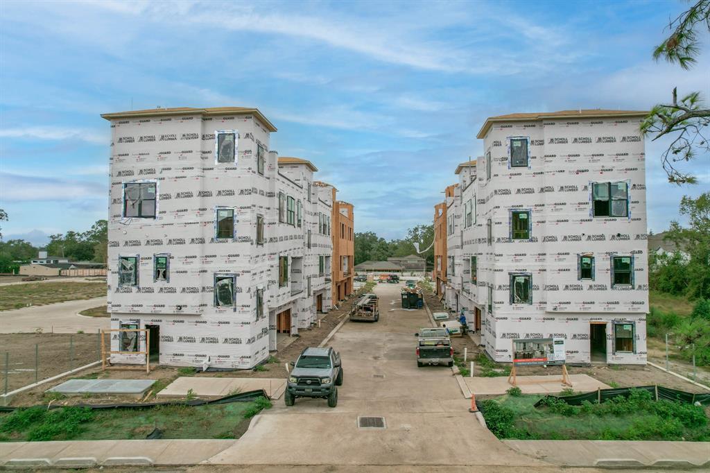 a front view of a building with street view