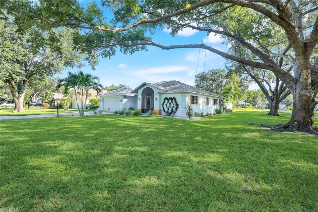 View of yard featuring a garage