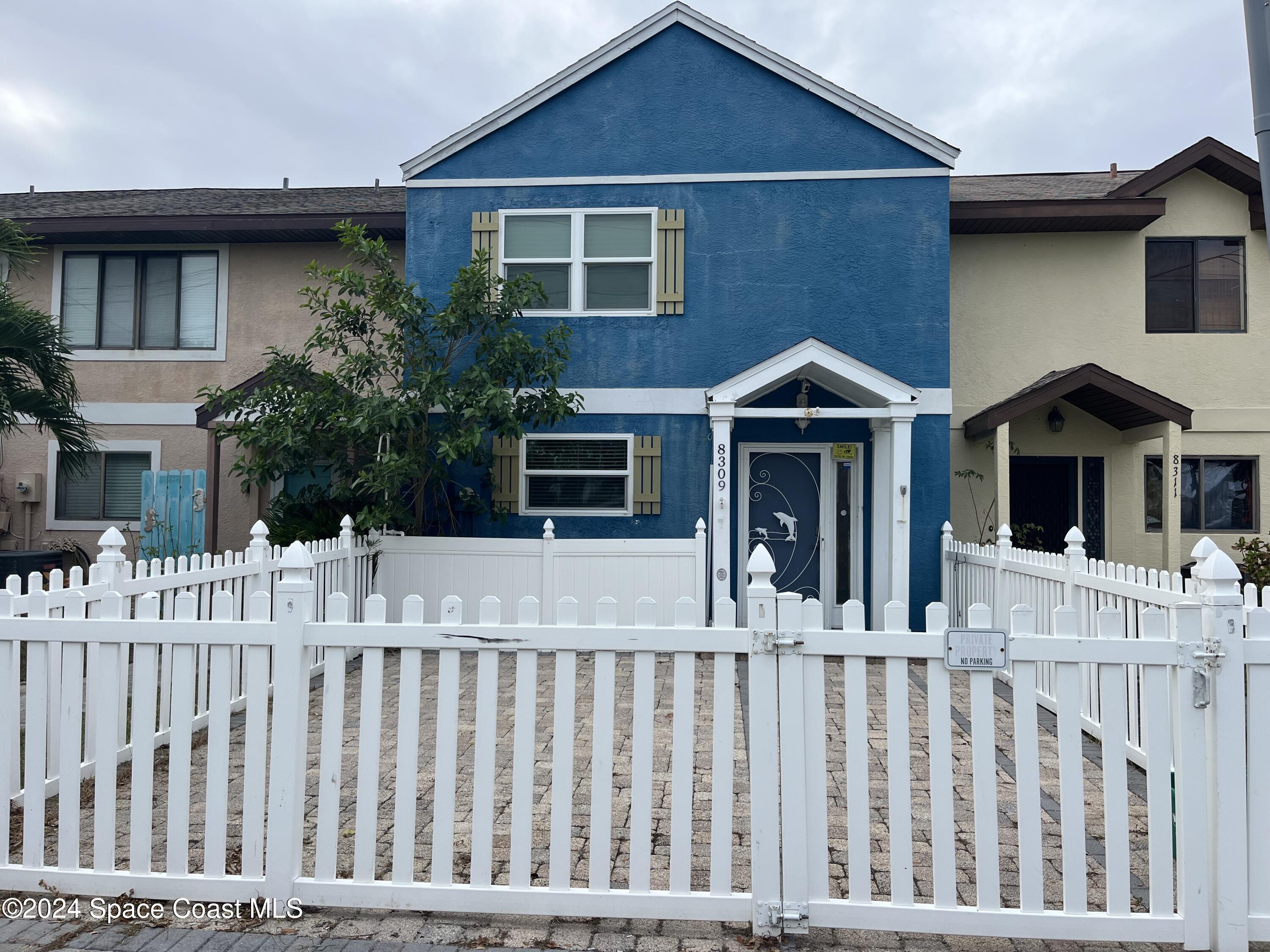 a front view of a house with a porch