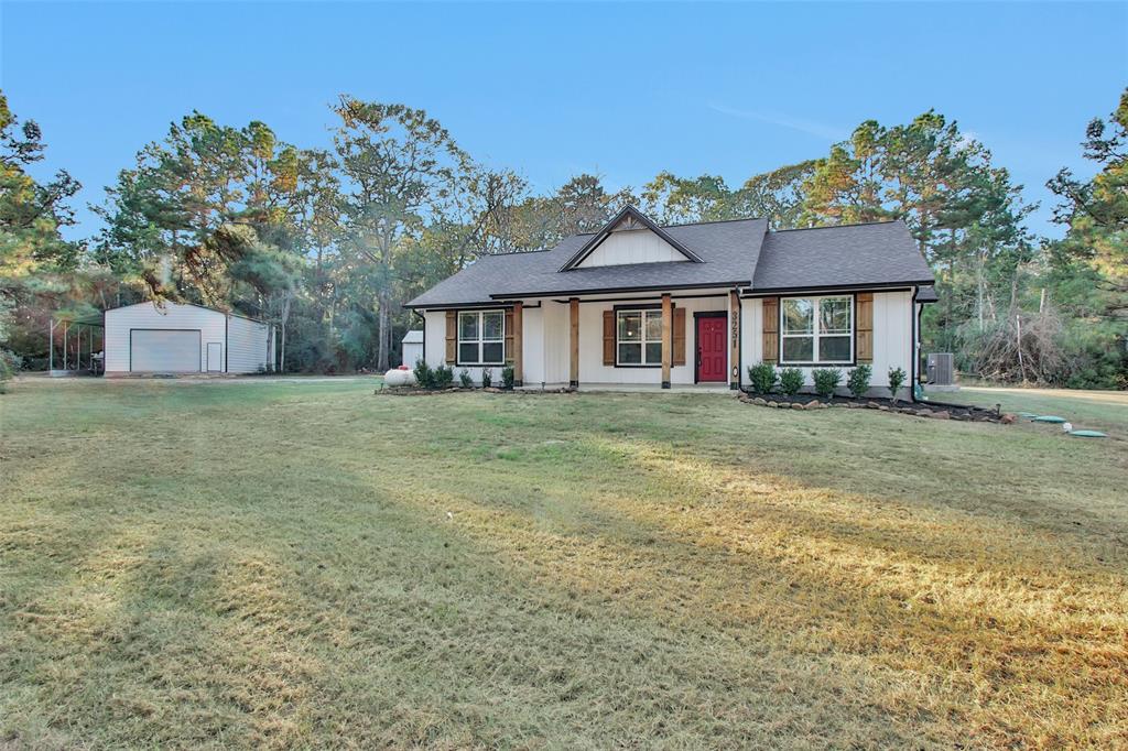 front view of a house with a yard