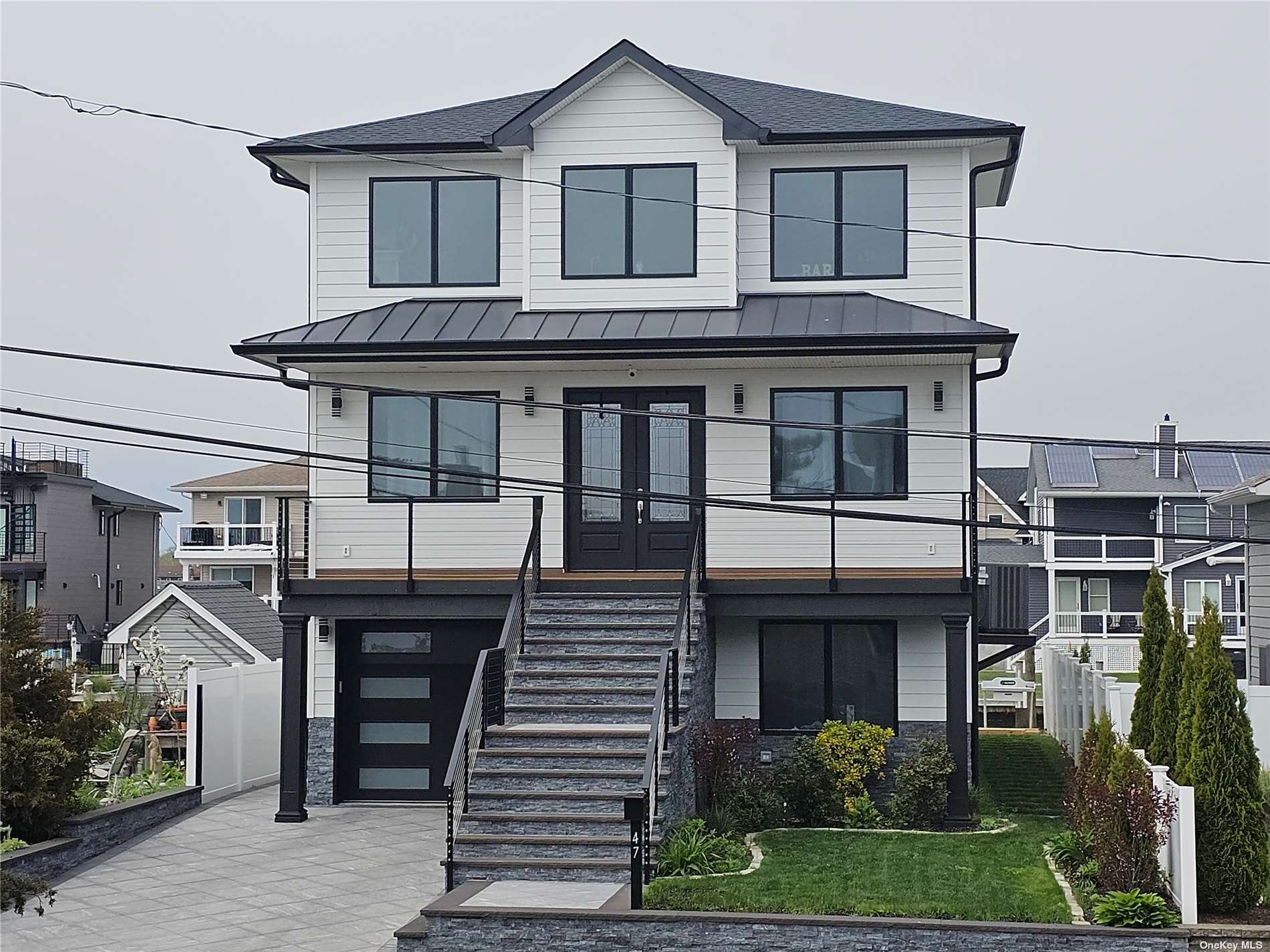 a front view of a house with a balcony