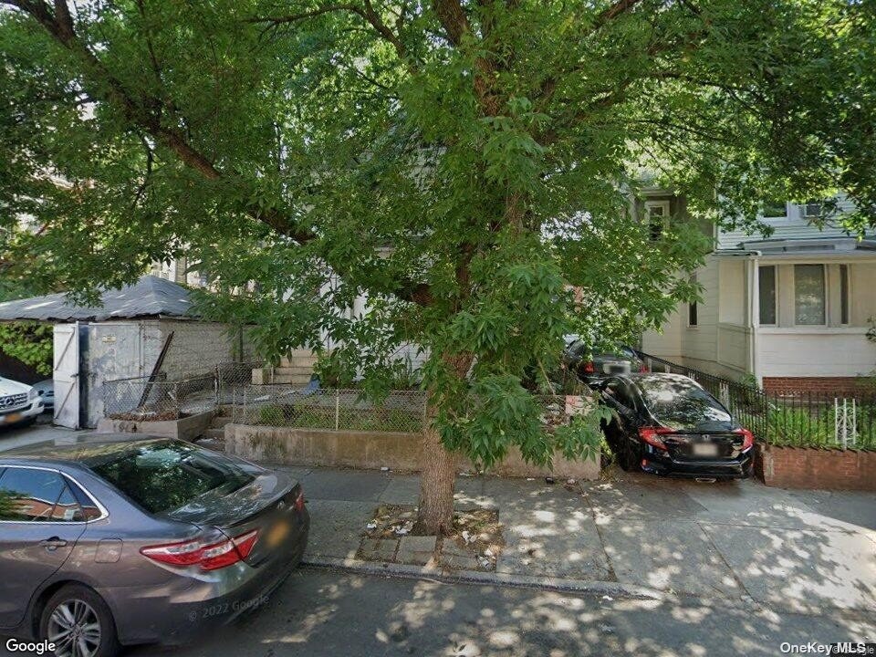 a car parked in front of a house