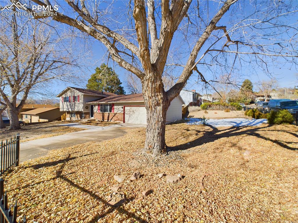 View of front of property with a garage