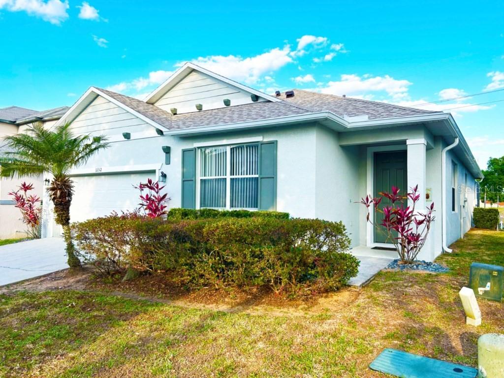 a front view of house with yard