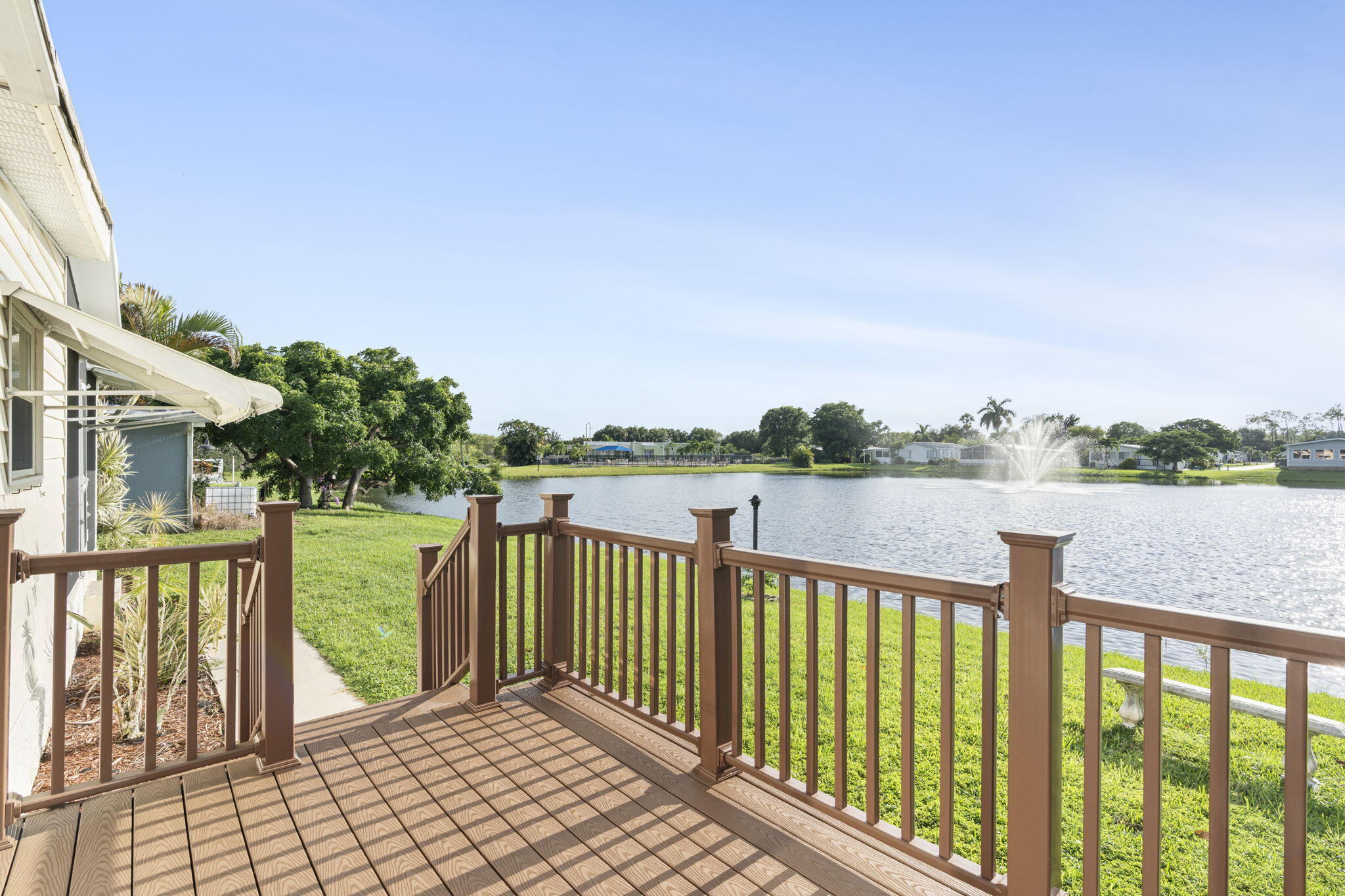 a view of a lake with a outdoor space