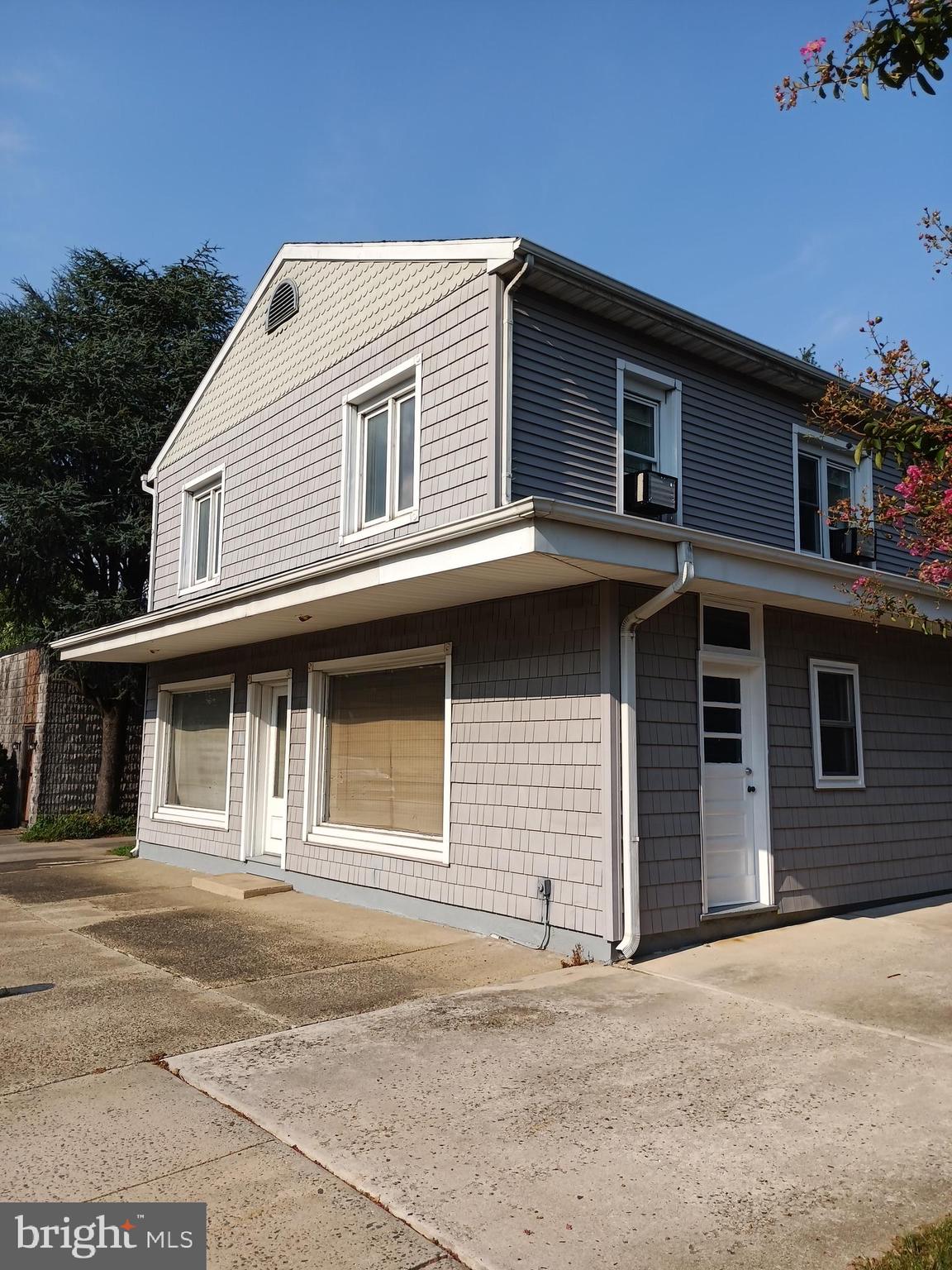 a front view of a house with a garage