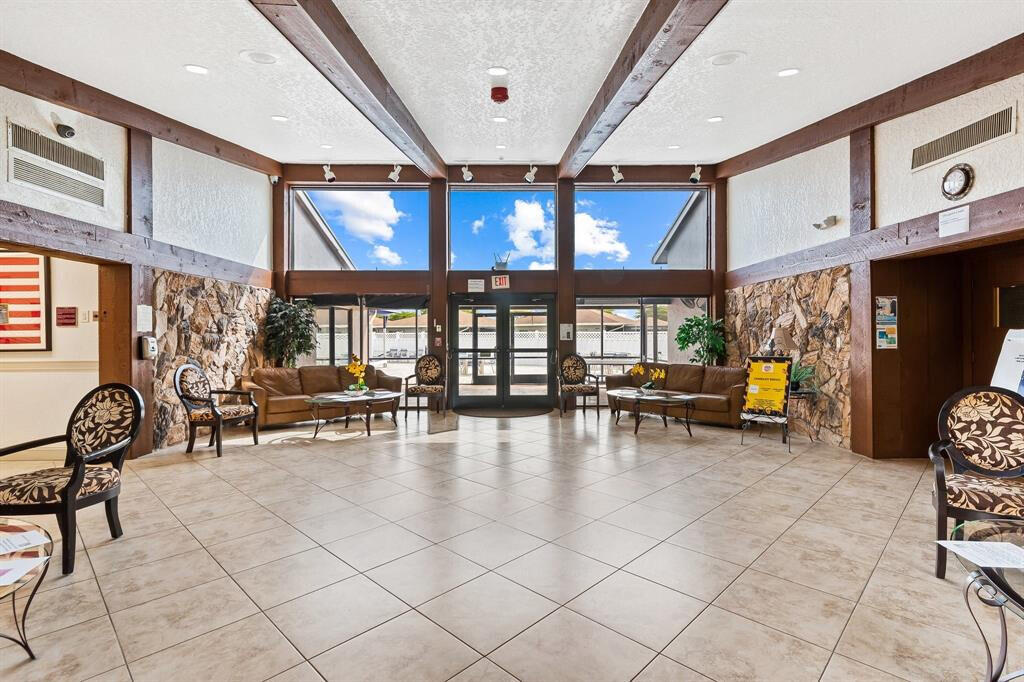 a view of dining room and hall with furniture