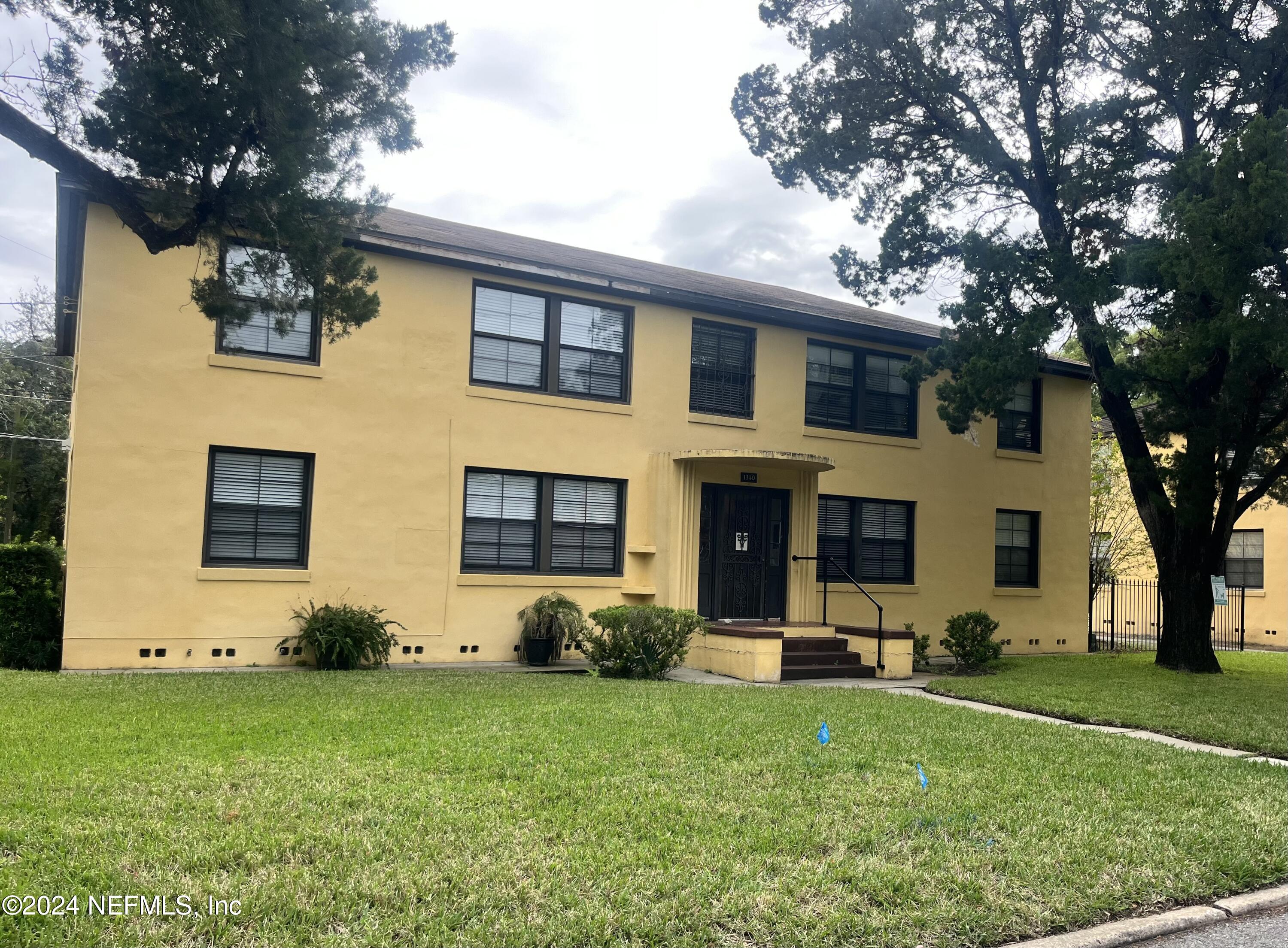 a front view of house with yard