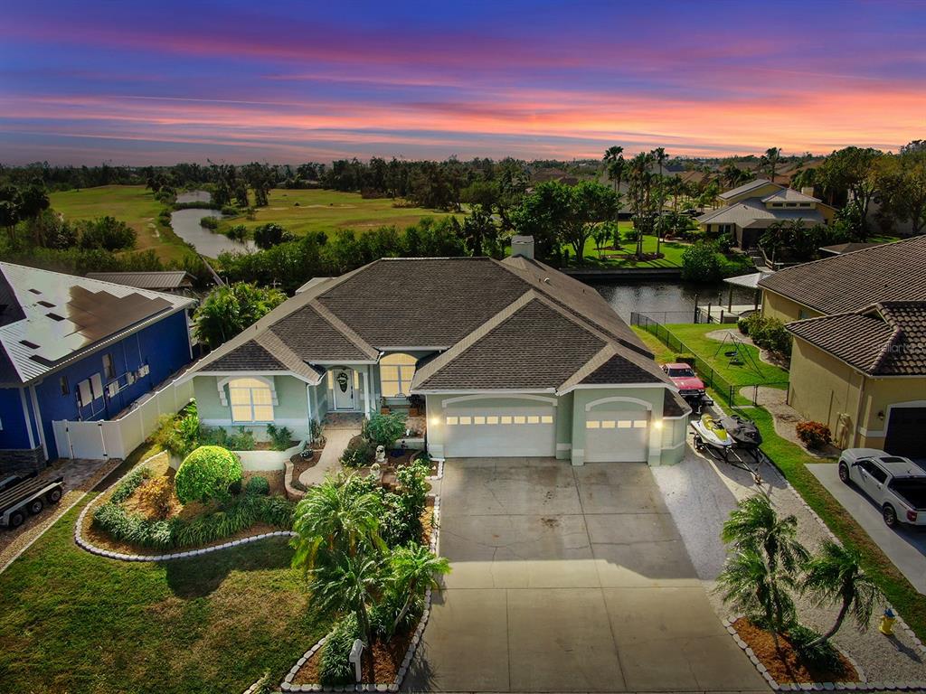 a aerial view of a house with a garden view