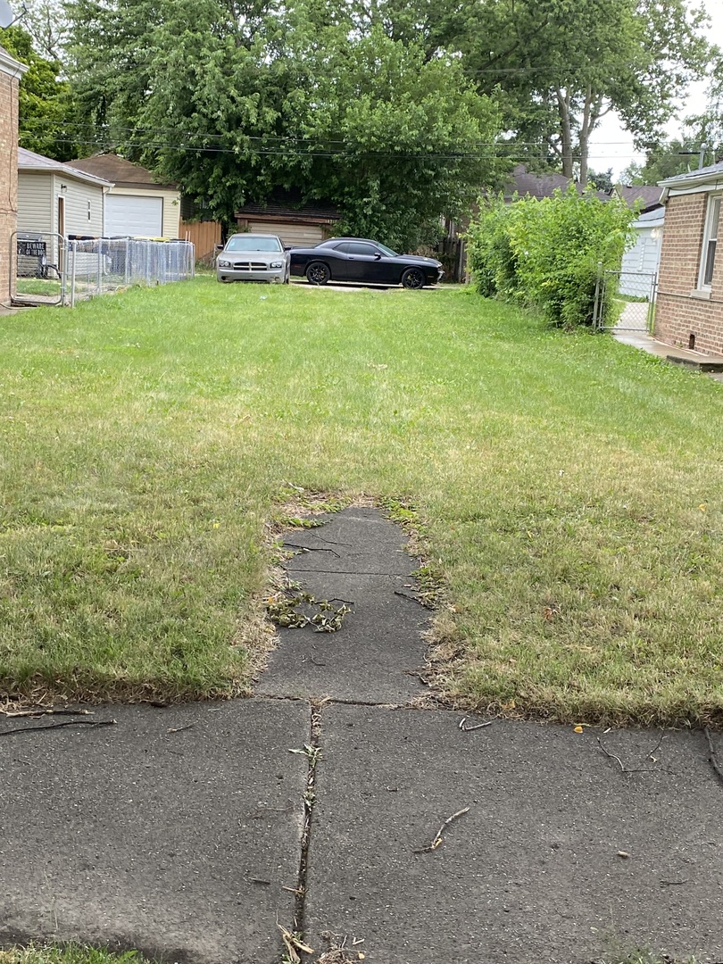 a view of a backyard with a garden