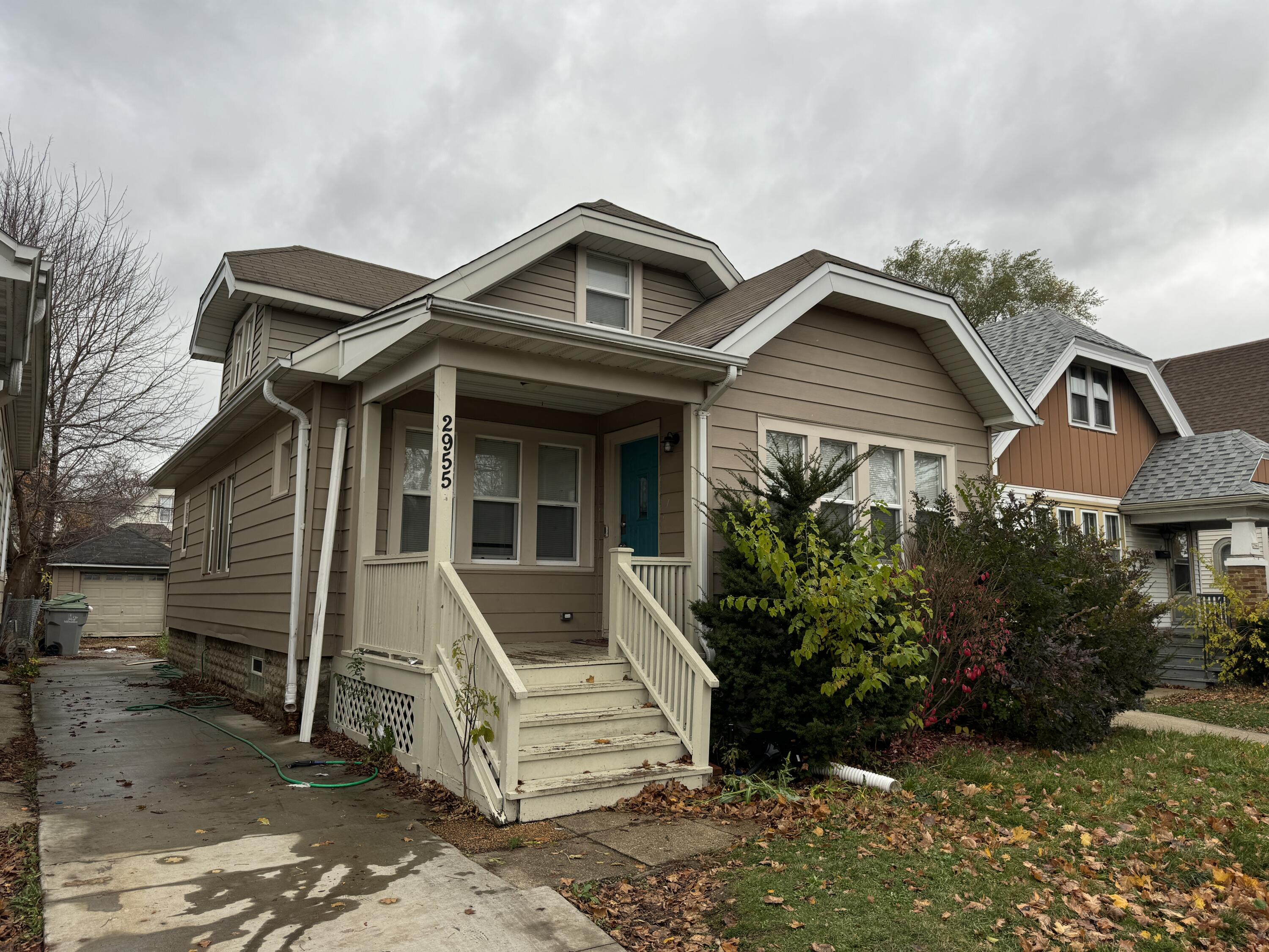 Front Entry and Paved Driveway