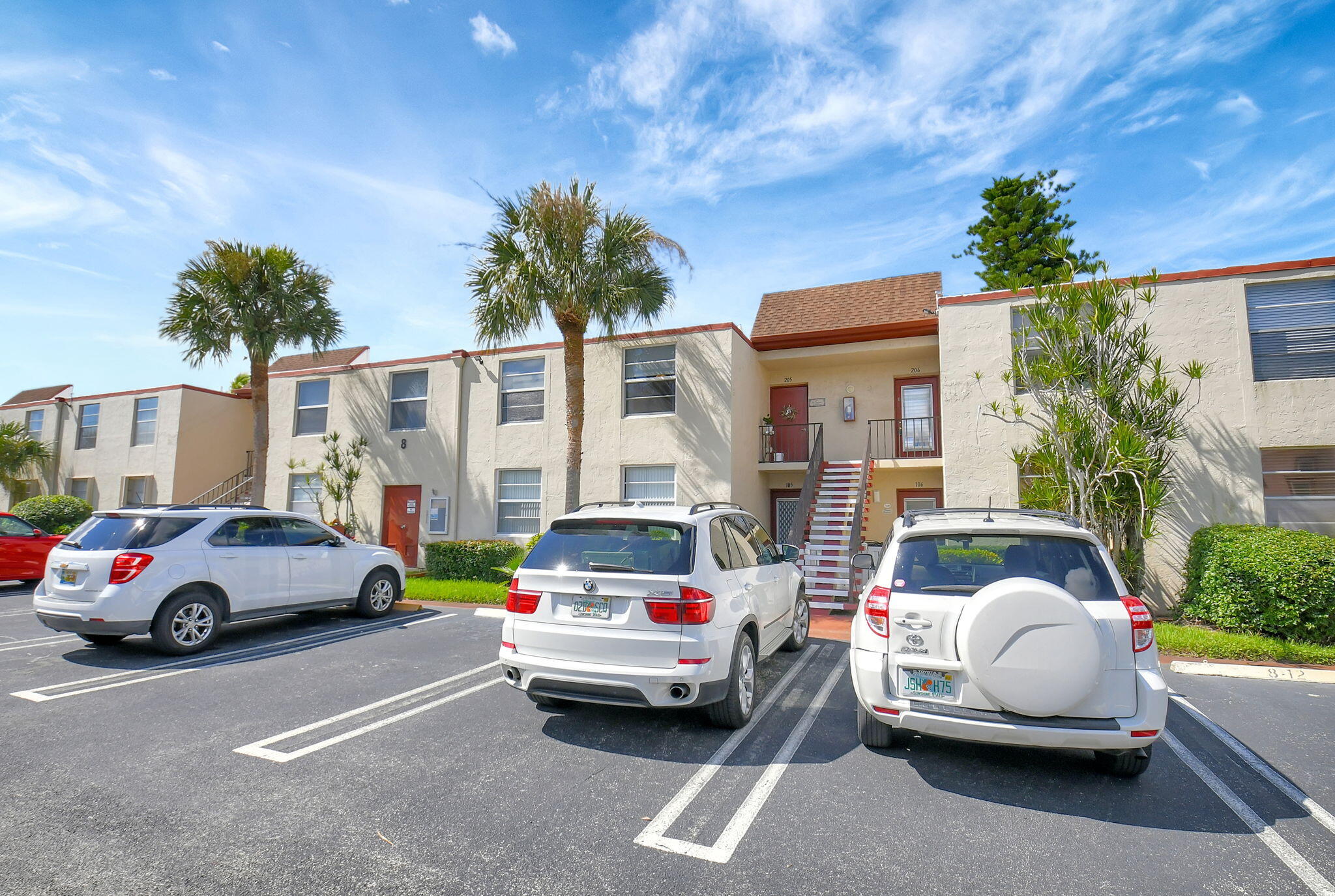 a cars parked in front of a house