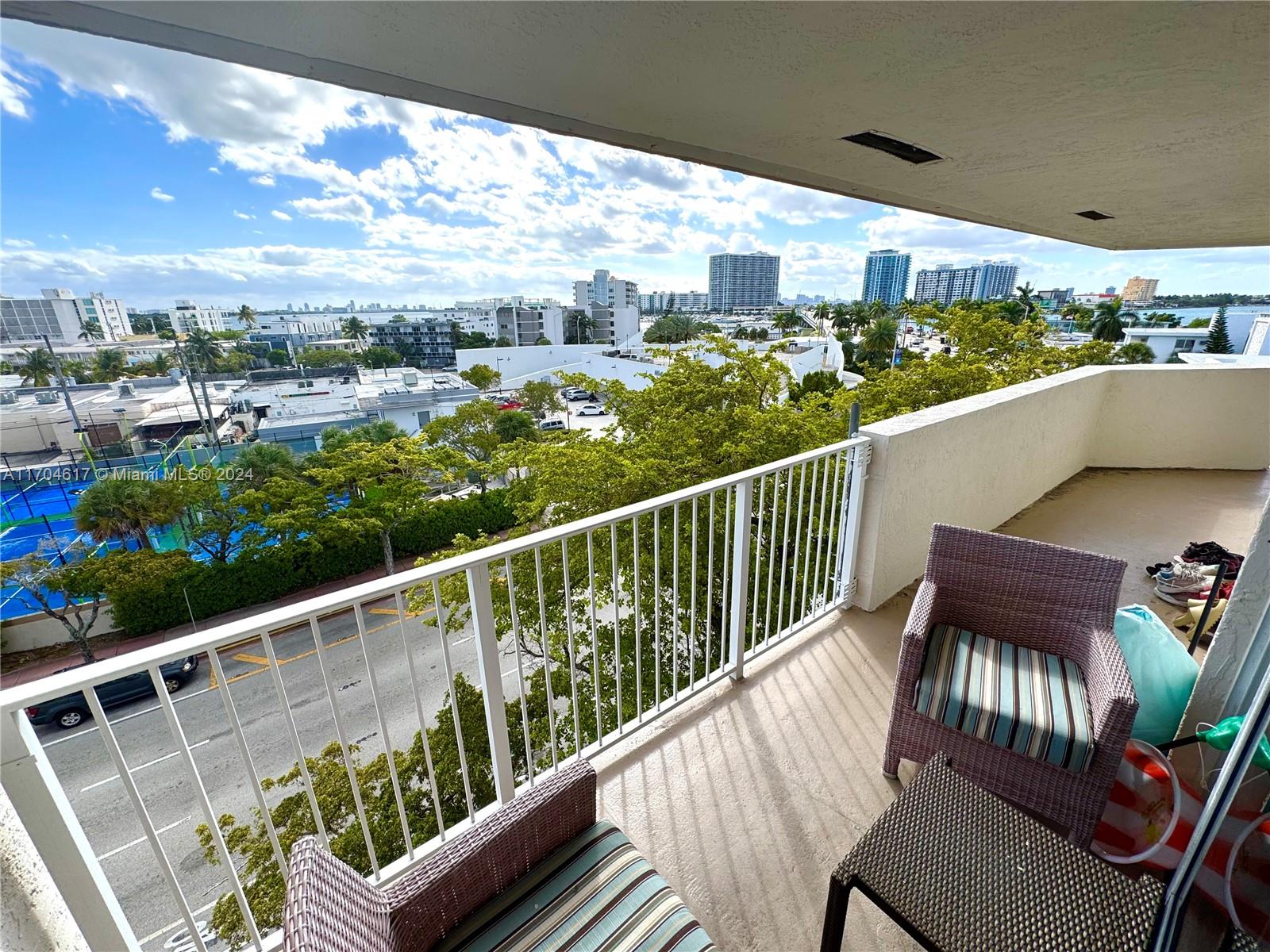 a view of a chairs in a balcony