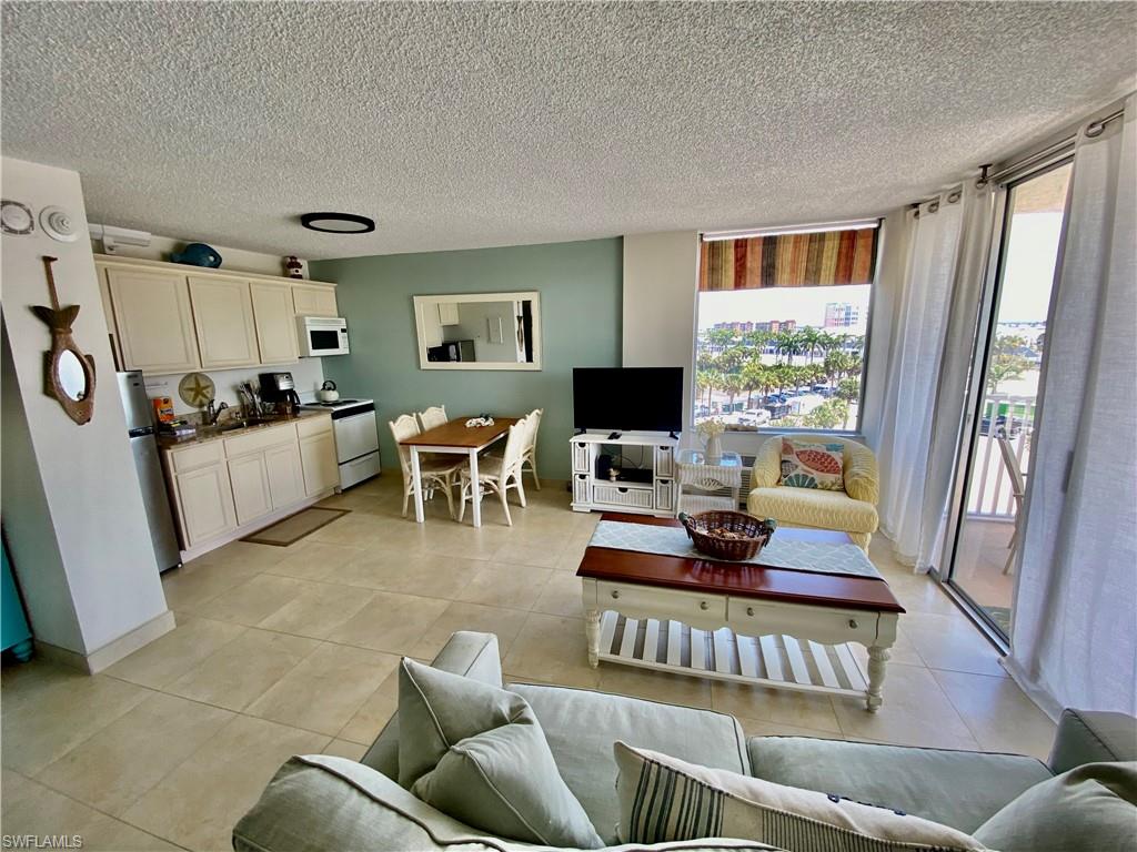 a living room with furniture and a window