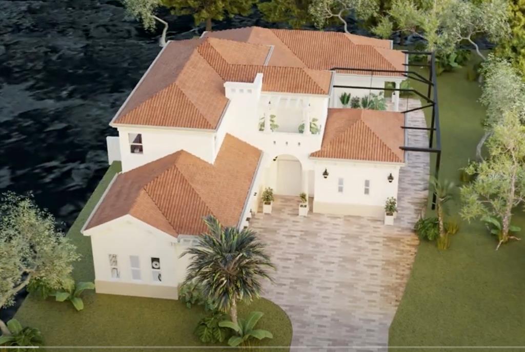 an aerial view of a house with outdoor space and lake view