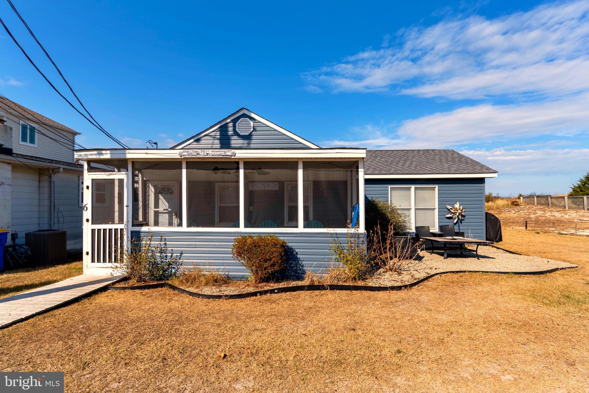 a front view of a house with patio