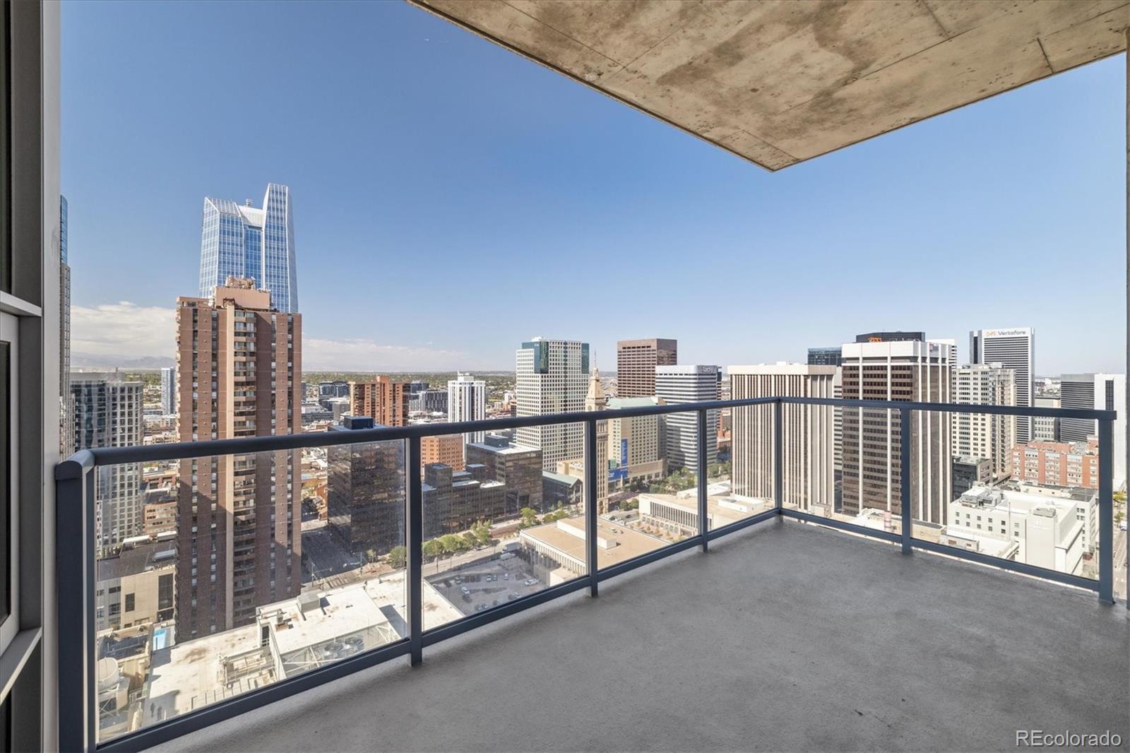 a view of a balcony with city view