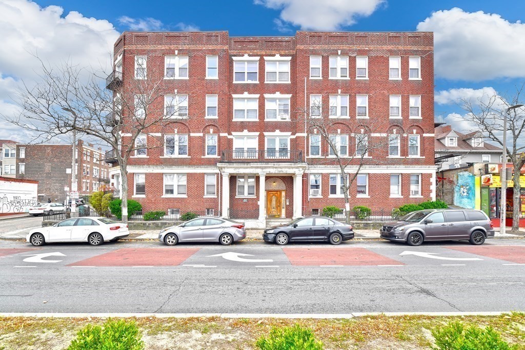 a cars parked in front of a building