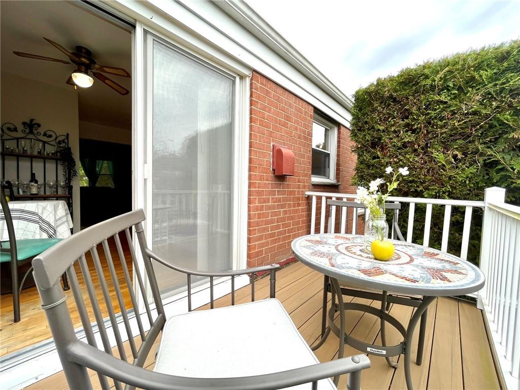 a view of a balcony dining area