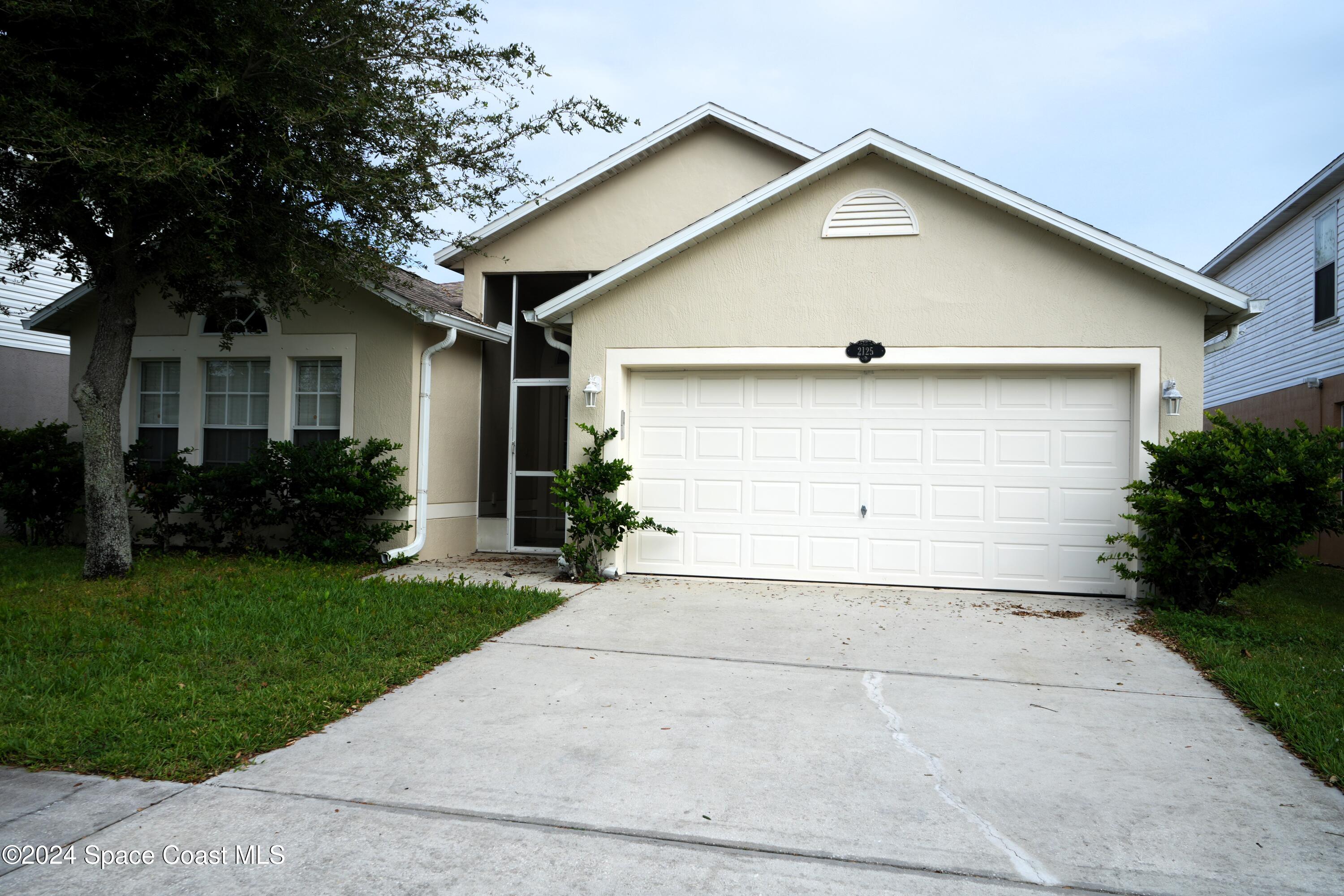 a front view of house with yard