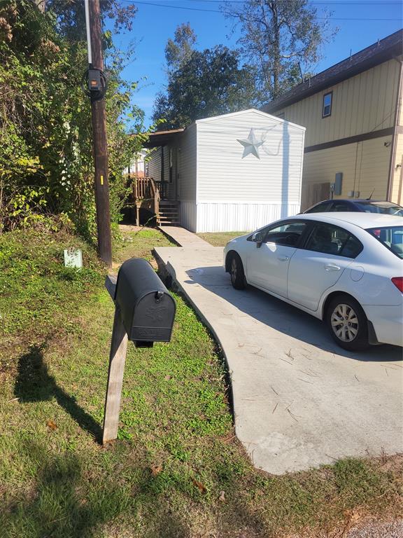 a view of a back yard of the house