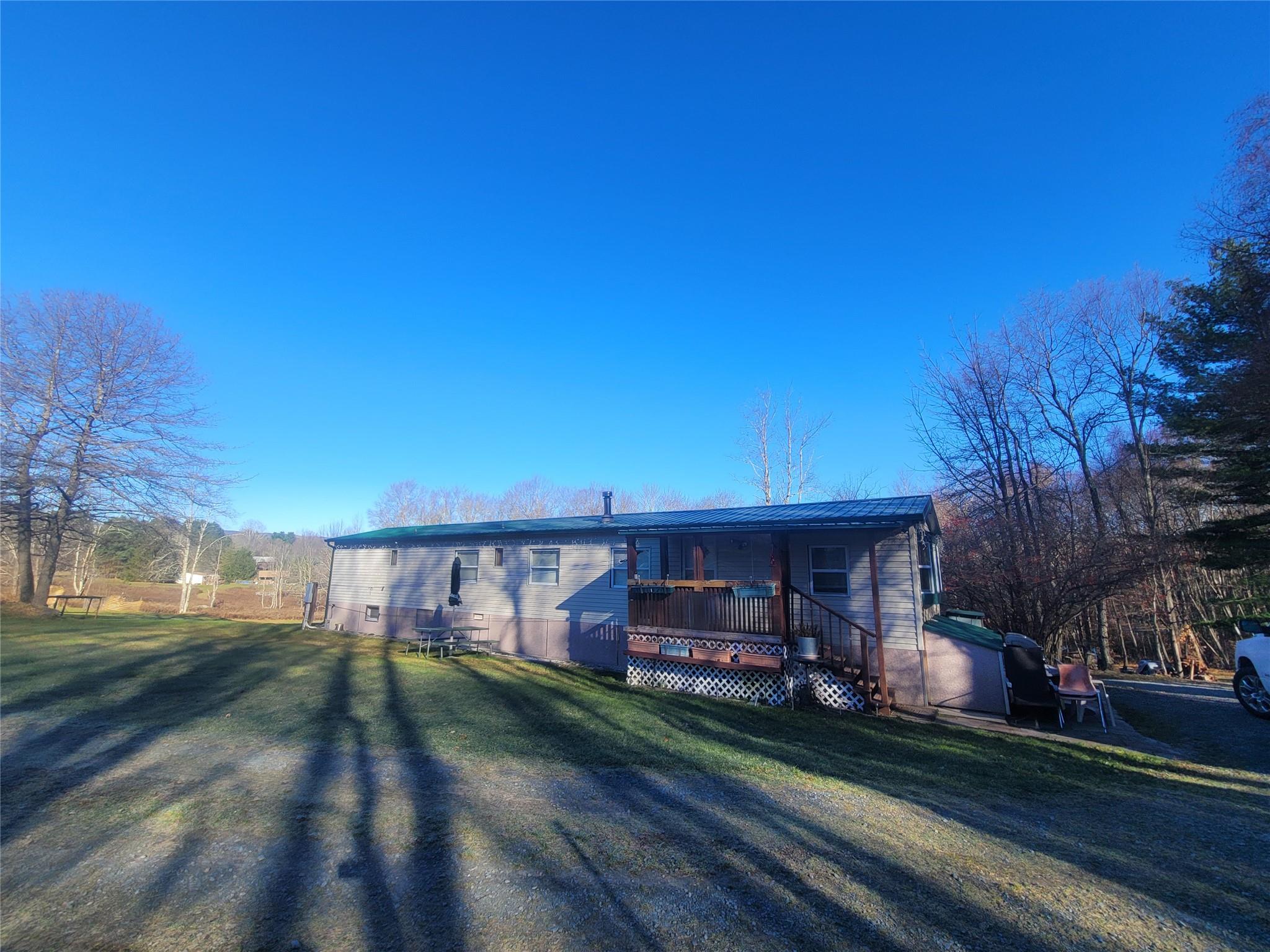 View of front of property with a front lawn