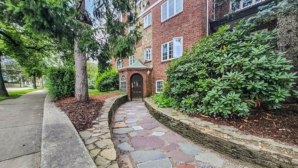 a view of a garden with pathway