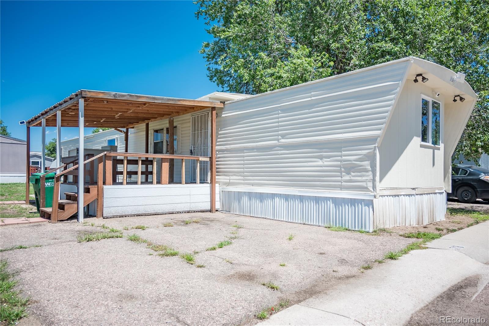 a front view of a house with a patio