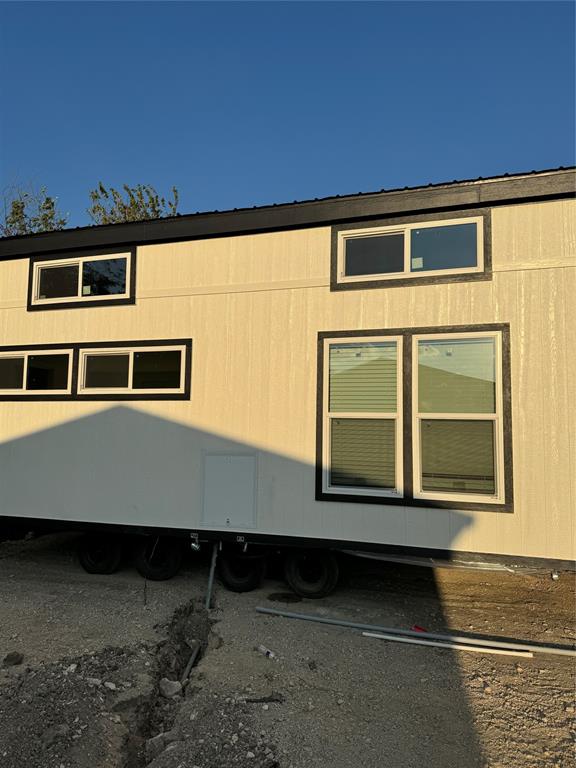 a front view of a house with a garage