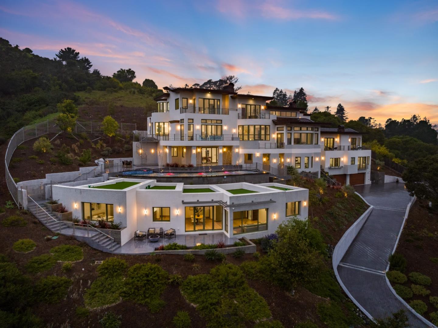 a aerial view of a house with a yard