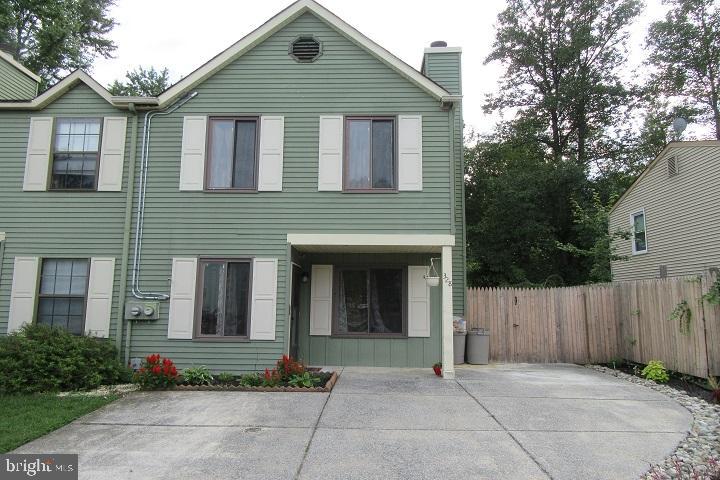 a view of house with outdoor space