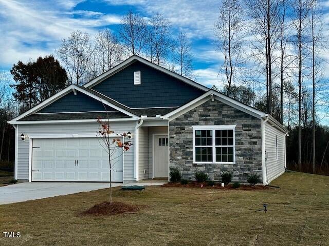 a front view of a house with a garage