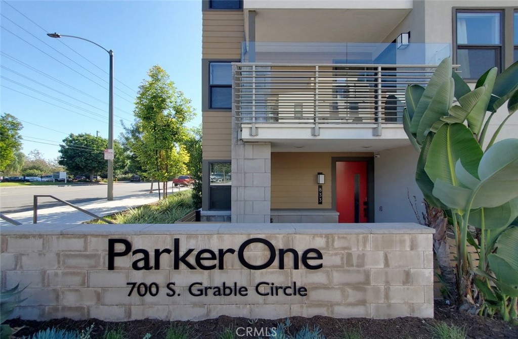 a view of house with sign broad