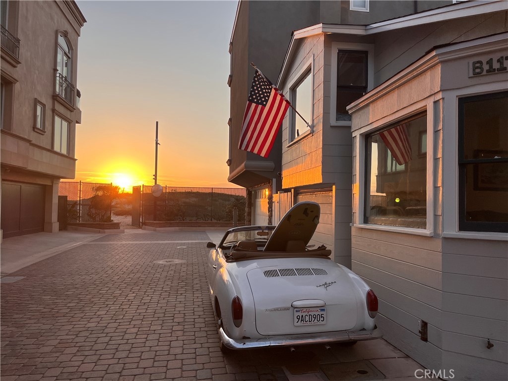 a view of roof deck with car parked