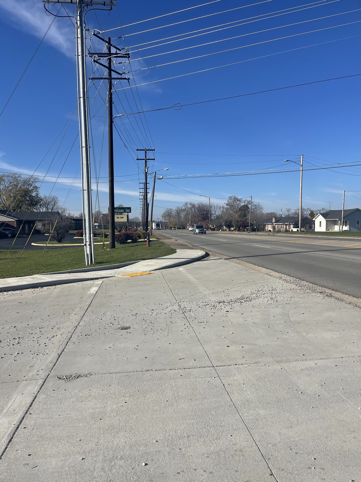 a view of a road with a road sign