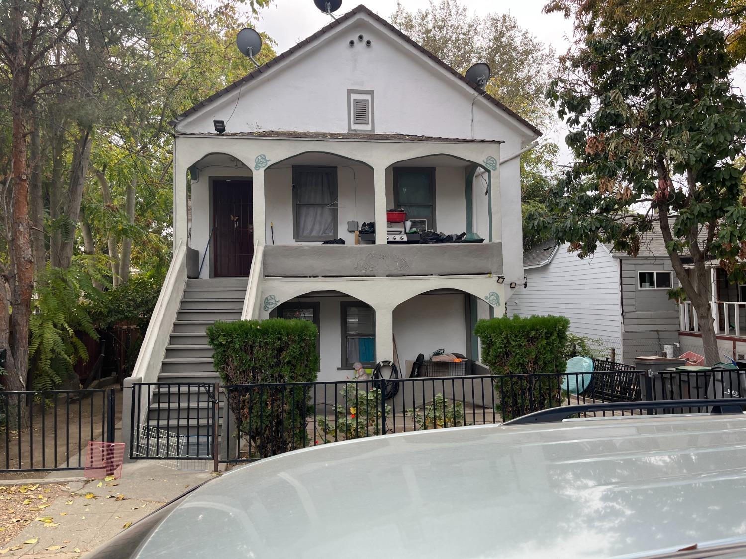 a front view of a house with yard