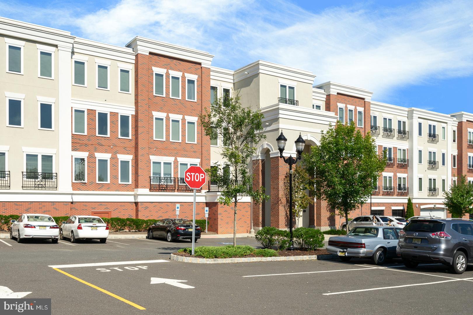 a view of a car parked in front of a building