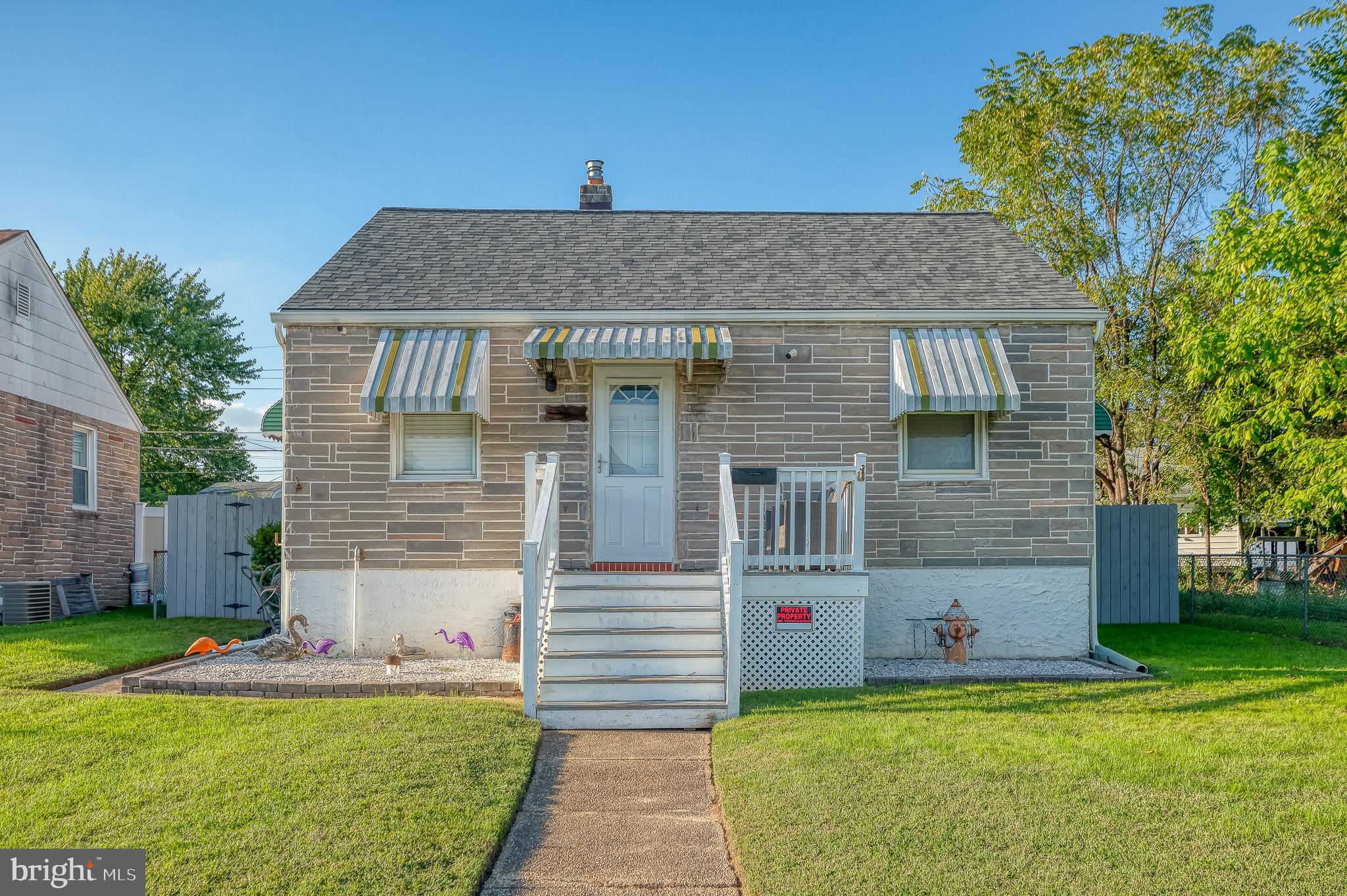 a front view of house with yard