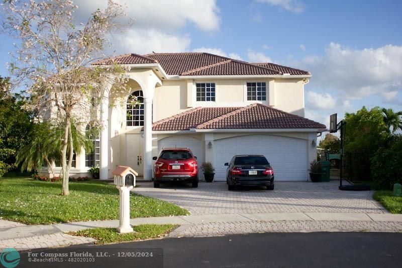 a car parked in front of a house