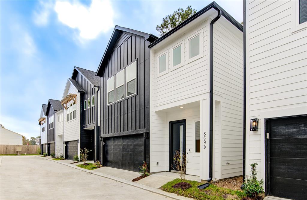 a front view of a house with a garage