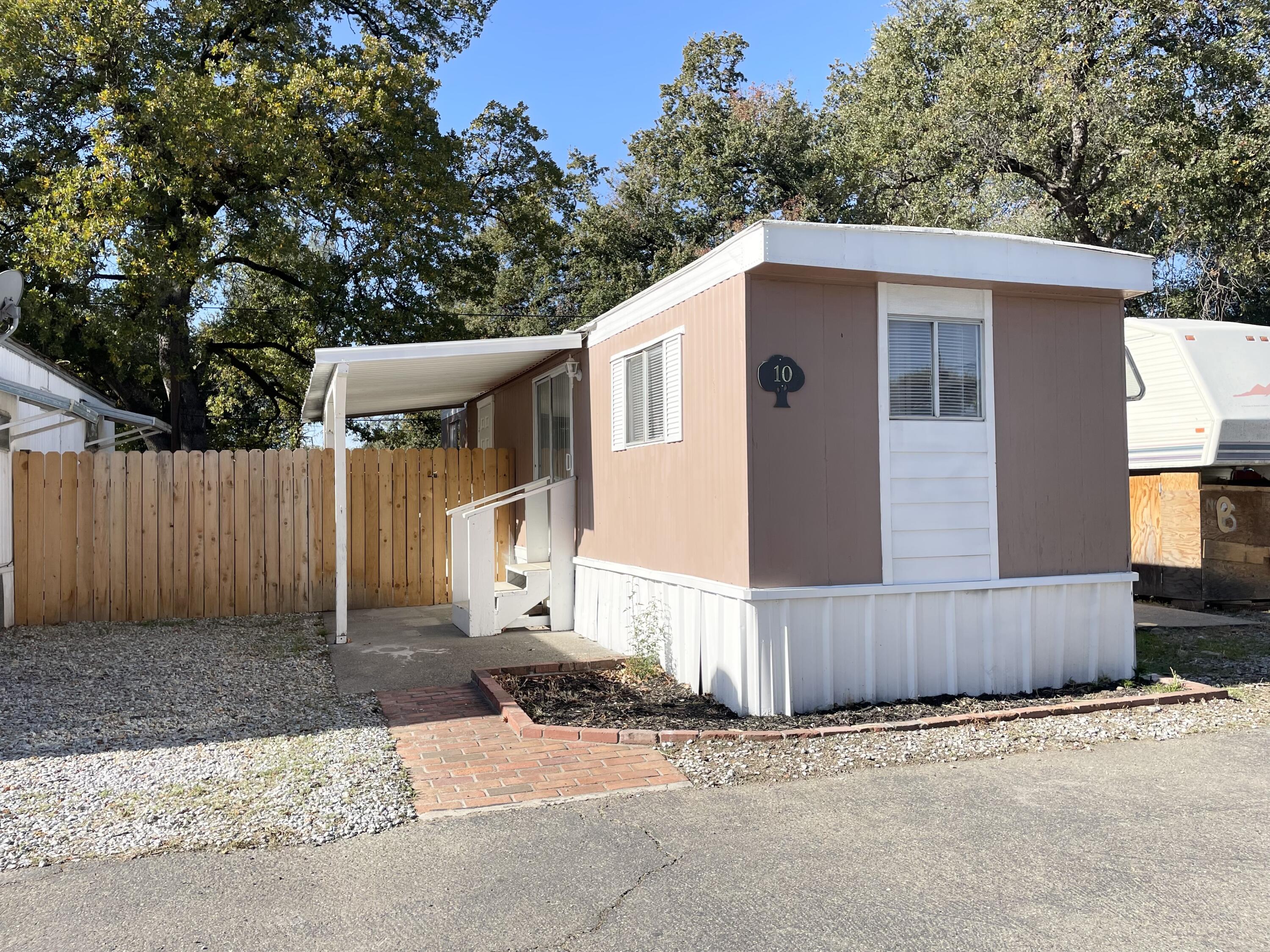 a front view of a house with a garage