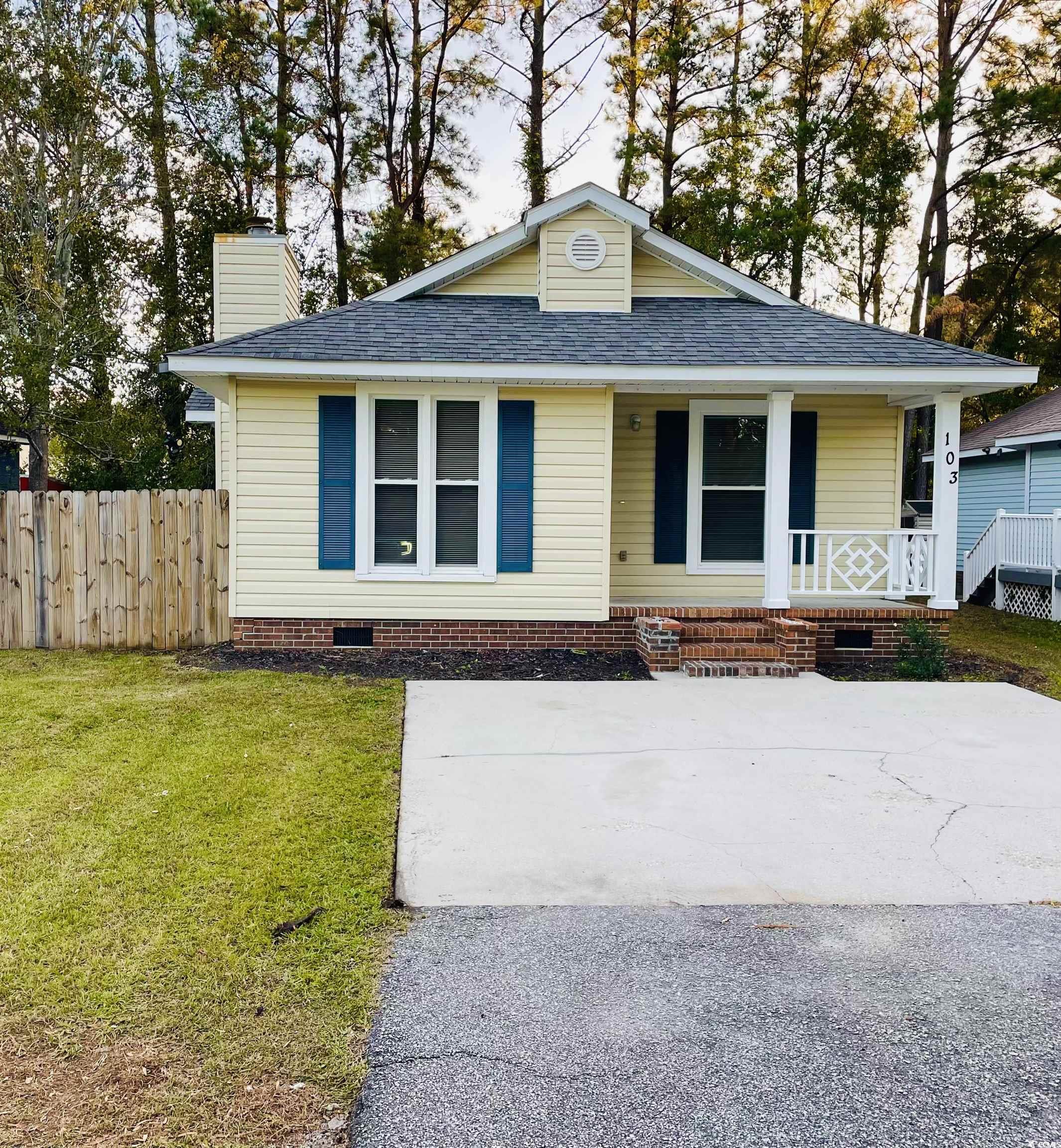 View of front of property featuring covered porch