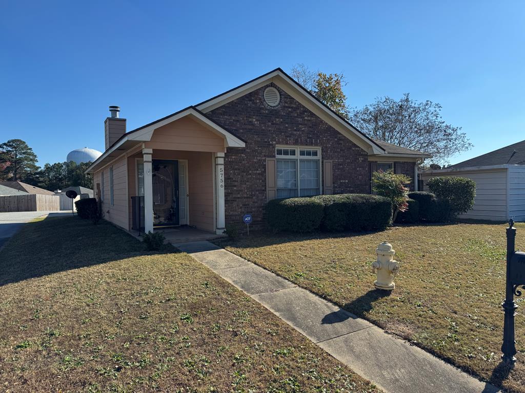 a front view of house with yard